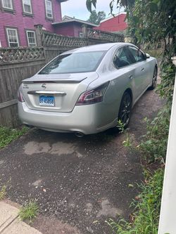 Nissan Maxima Silver 4-Door Sedan