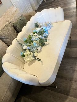 Cream Boucle Shell-Back Accent Chair.  Modern loveseat