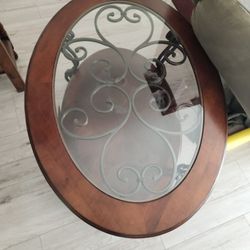 Oblong Glass/Top Living Room Table With Medium Oak Finish And Decorative Bronze Tone Iron Base