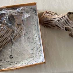 Heeled sandals, new never been used before. With the box. 