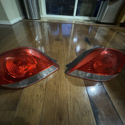 Hyundai Tiburon OEM Tail Lights