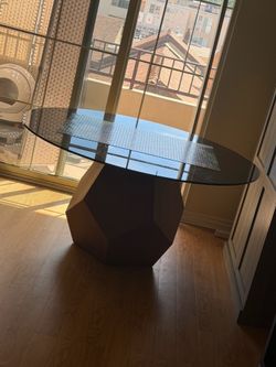 Modern Smoked Glass Round Dining Table with Geometric Wood Base