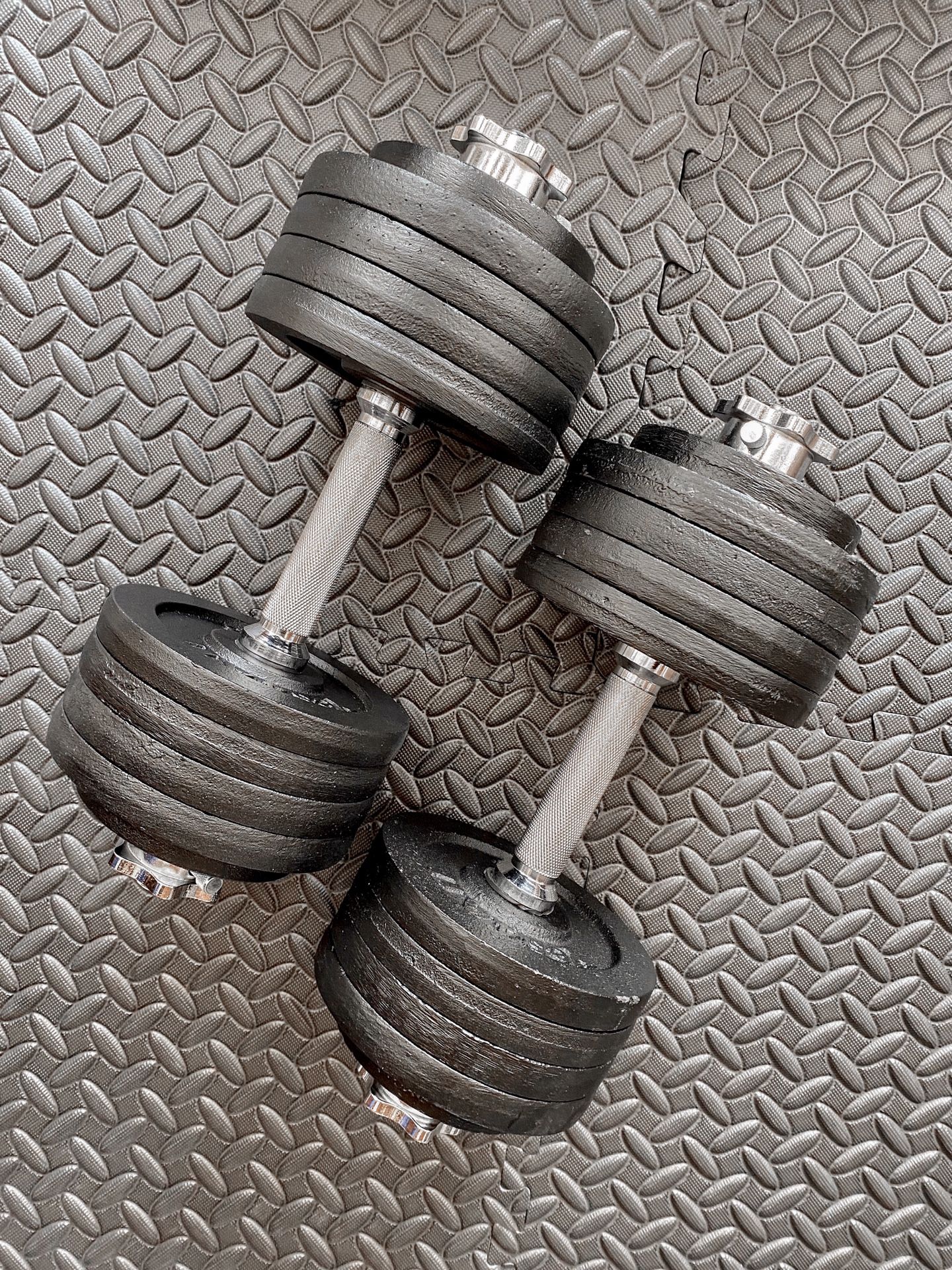 Brand new in box 105 lb (52.5x2u) pair adjustable dumbbells All Solid Steel (not negotiable)