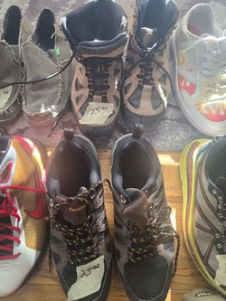 Nine pairs of used sports and outdoors shoes