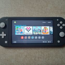 NINTENDO SWITCH LITE (Modded) With 7000 GAMES