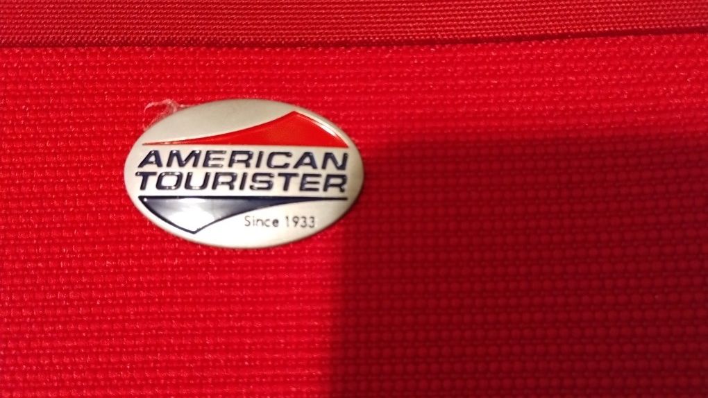 Three Luggages American Tourist Two Rollers And A Carrying Bag Brand New