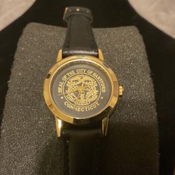 Goldtone Stainless Steel Watch With Genuine Leather Band..(SEAL OF THE CITY HARTFORD CONNECTICUT)