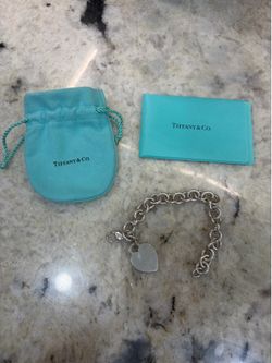 Tiffany heavy silver bracelet with heart