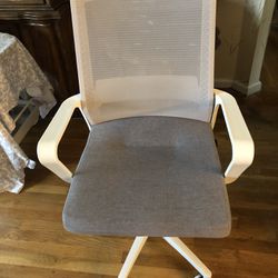 Practically New Neo Swivel Chair With Adjustable Position Up Or Down And Back
