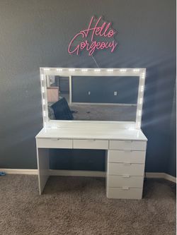 Vanity with dimmable lights.