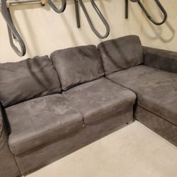 Real Suede 2 Piece Sectional With Sleeper And Storage