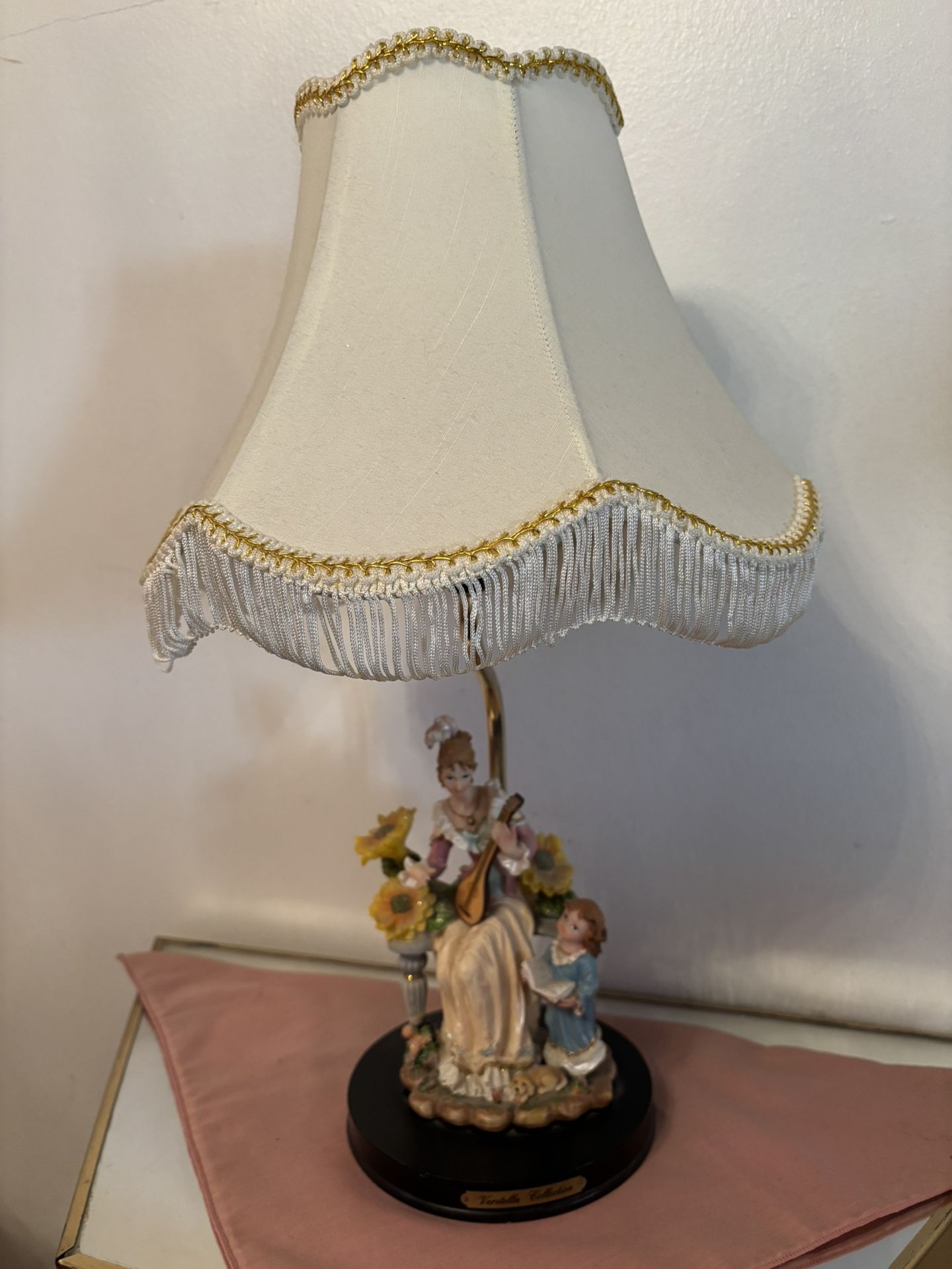 Lady with children, Victorian lamp