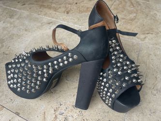 High hills with studs. Genuine leather 8.5 new