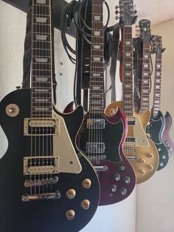 Les Paul Epiphone traditional pro IV 4 with set up black natural coil tap