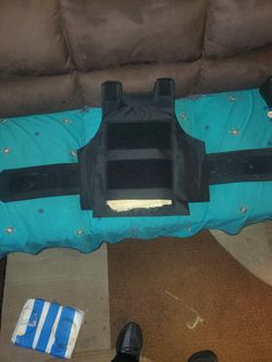 NEW WEIGHTED VEST, PACKED WITH HEAVY KEVLAR MATERIAL. FITS MEDIUM TO 2X.