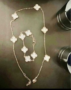 Beautiful clover, necklace, and bracelet