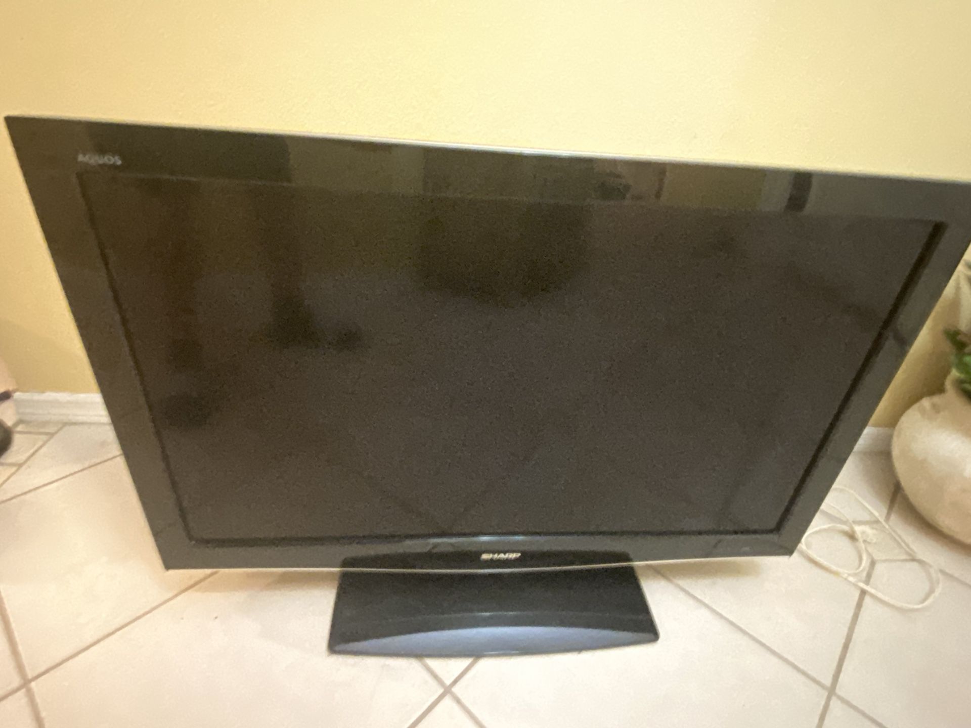 Sharp Aquos HD 1080p 42 inch TV with remote and cord