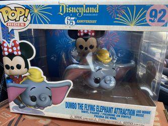 Dumbo The Flying Attraction and Minnie Mouse