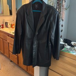 Prak-ti-kal Leather Jacket. 