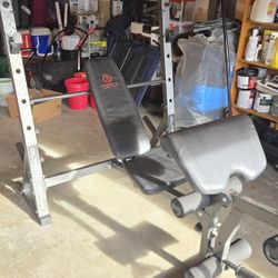 Olympic bench with preacher, curl, leg, curl and squat rack. All in one