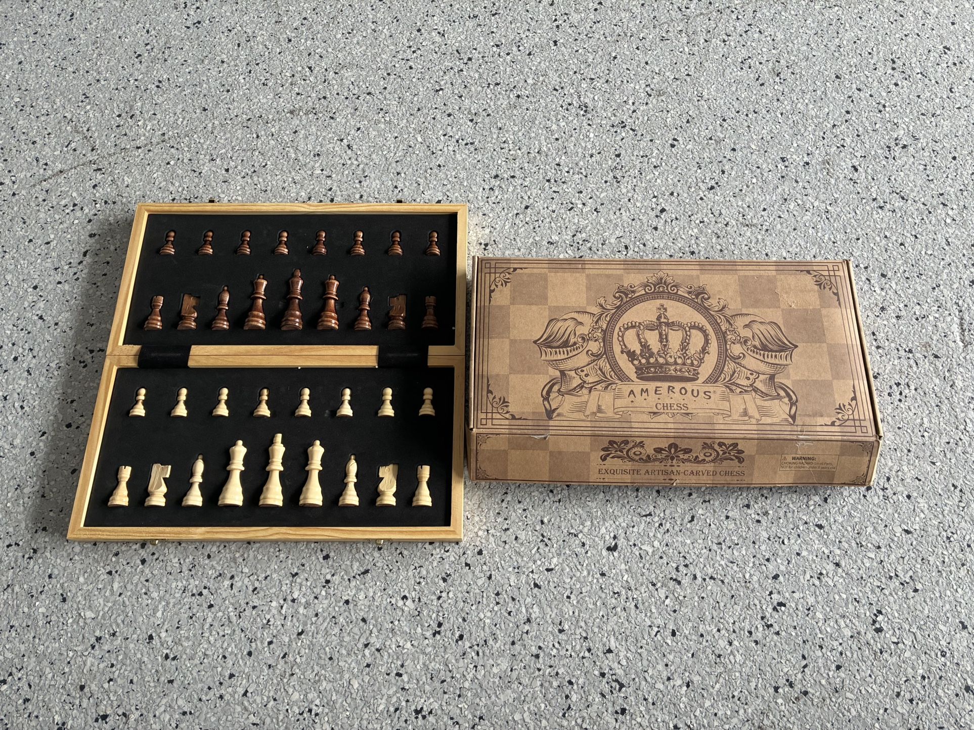 “AMEROUS” Exquisite Artisan Carved Fold Up Chess Board & Pieces. Approx. 15x15.