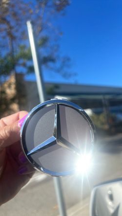 3 Mercedes Benz rim caps for $21.00