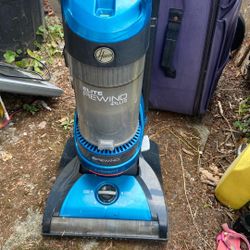 Hoover Vacuum Works Good Cord Self Rewind Price 25$. Pick Up. E. 72. and Grand View. E.  Tacoma 