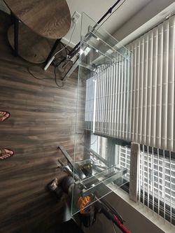 Glass desk with adjustable chrome trestle legs
