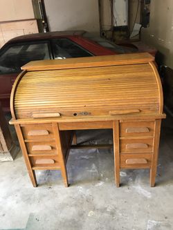 Solid oak desk, chair included.