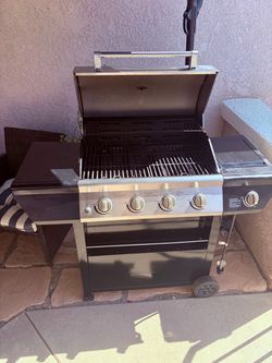 GrillMaster 4-Burner Propane Gas Grill w/ Side Burner + Lodge Cast Iron Griddle
