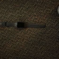 Apple Watch Series 4 (44mm) A1976 (GPS + LTE) - Space Gray AL/Black Sport Band.