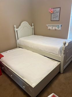 Twin Trundle storage bed with 2 twin mattresses