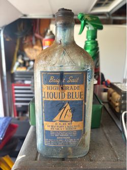 Vintage liquid blue bottle.