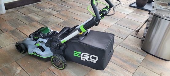 EGO 56V 21" Self Propelled Lawn Mower with 7.5Ah Battery and Rapid Charger. Only used twice.