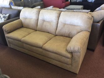 Tan microfiber sofa and loveseat
