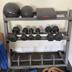 Weight Rack And Dumbells