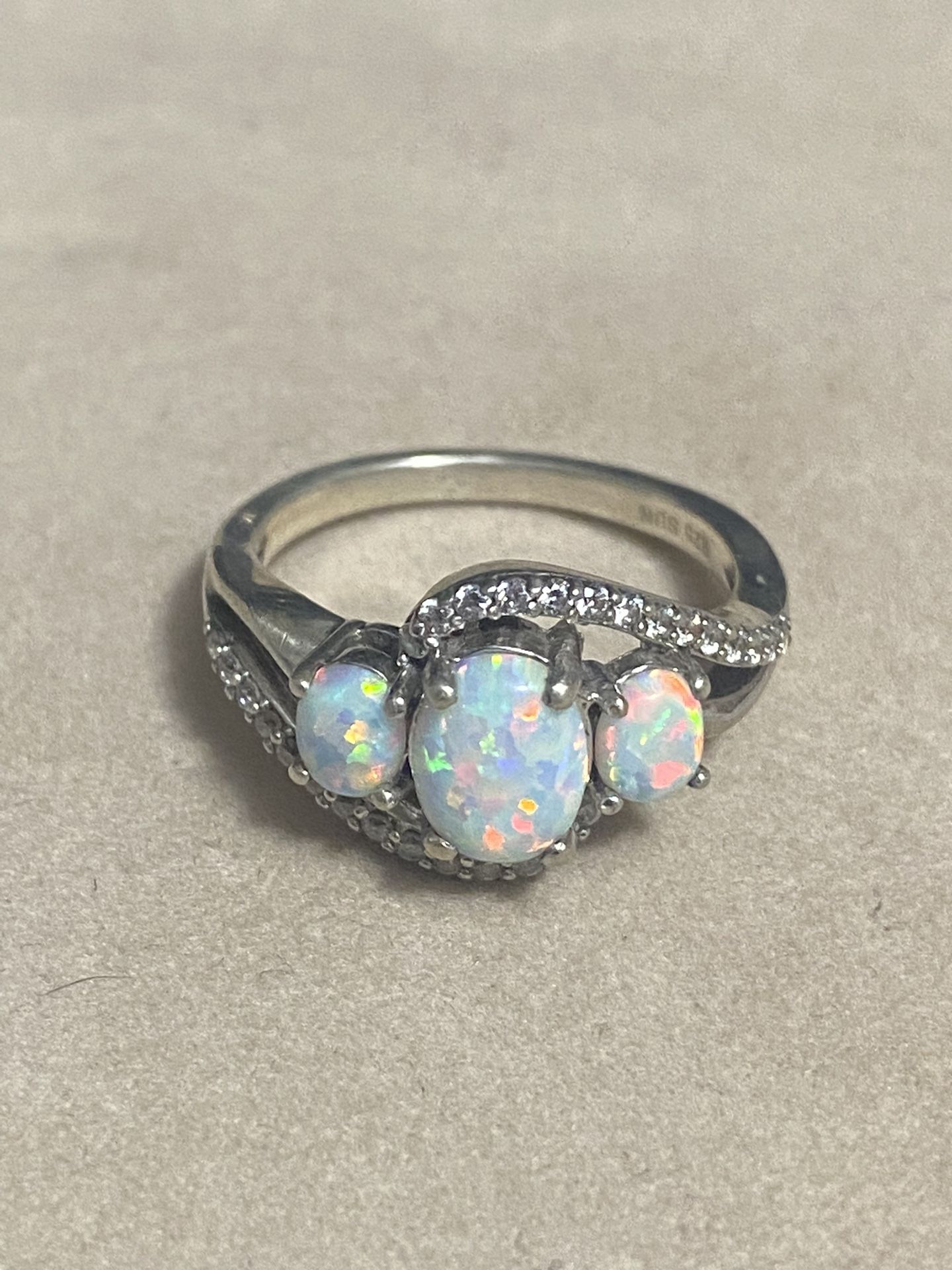 Vintage fire opal ring in fine retro ring, sterling silver number 925, size 61/2 asking $45, firm price.