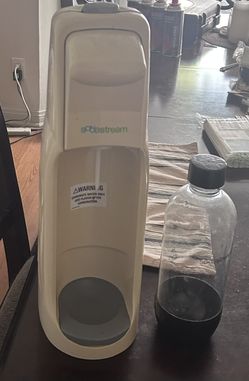 Soda Stream with bottle and partially used gas canister