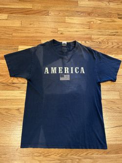 America dark blue fadded vintage t shirt  Size Large  Small rips at the arm pits
