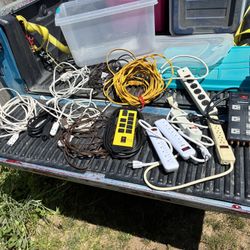 Many extension cords including I believe it’s a 50/75ft yellow outside extension cord and many surge protector multi plug ins. Everything in good shap