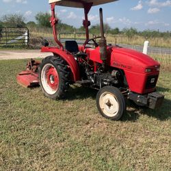 1995 FARM PRO 2420, 2WD Tractor with Shredder.