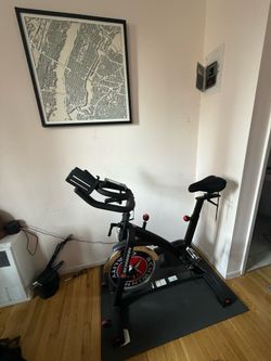 Schwinn stationary bike with floor Matt