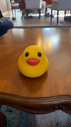 Yellow duck Squeeezy Squishy New with tags