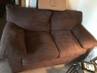 2 love seats 2 end tables and one center table