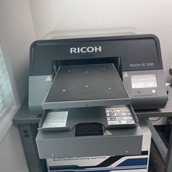 Ricoh Ri1000 Direct to Garment Printer  (2) Printers