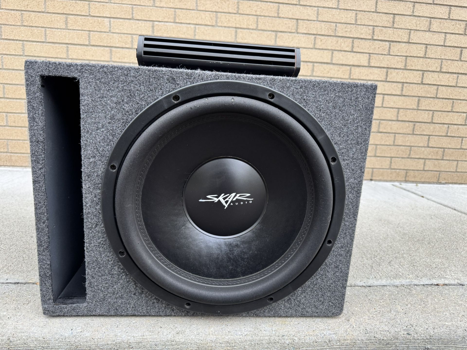 15"Skar Audio Vvx in ported box and kicker 1,200w Mono amp
