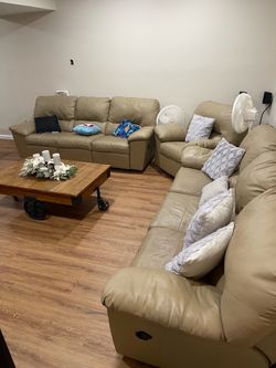 Faux leather reclining couch set