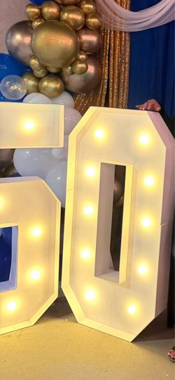 #50 sign and center pieces