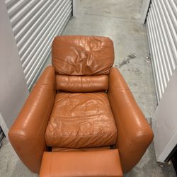 Leather Orange Recliner . Price Including Delivery 