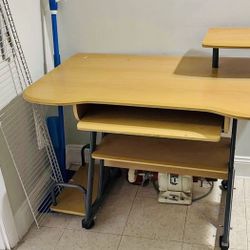 Multilevel Computer desk with surfaces for keyboard, screen, speakers, tower etc. 